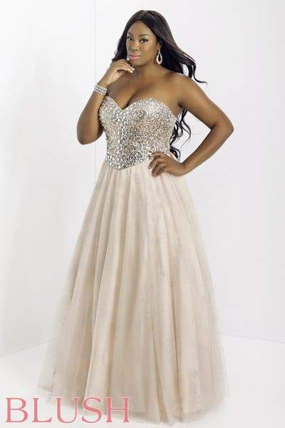 Liris Crosse is modeling the heck out of this crystal studded gown.