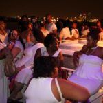 Guests relax on the rooftop of the Boat