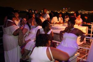 Guests relax on the rooftop of the Boat