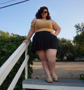 plus size tumblr, plus size skater skirt, plus size off the shoulder blouse, yellow crop top, trendy tumblr, plus size fashion, plus size trends, black skirt