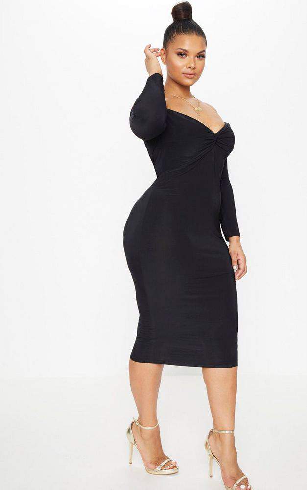 How many plus size little black dresses do you own? We are having a little fun in this Premme Plus size little black dress and sharing a few more LBD finds!