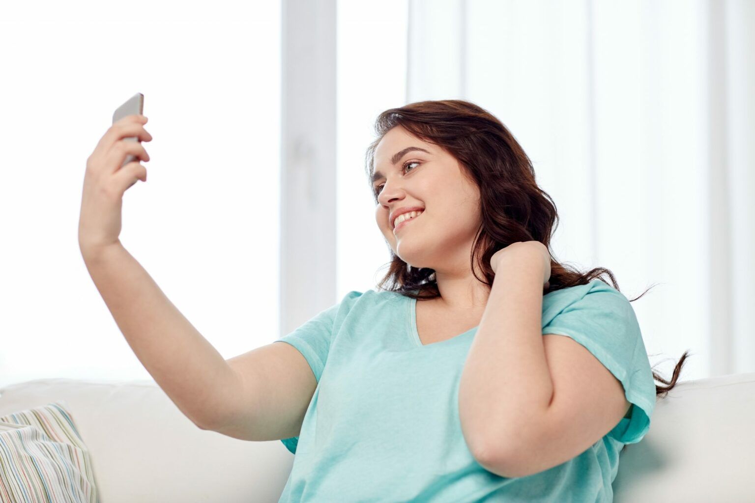 Canva Happy plus Size Woman with Smartphone at Home