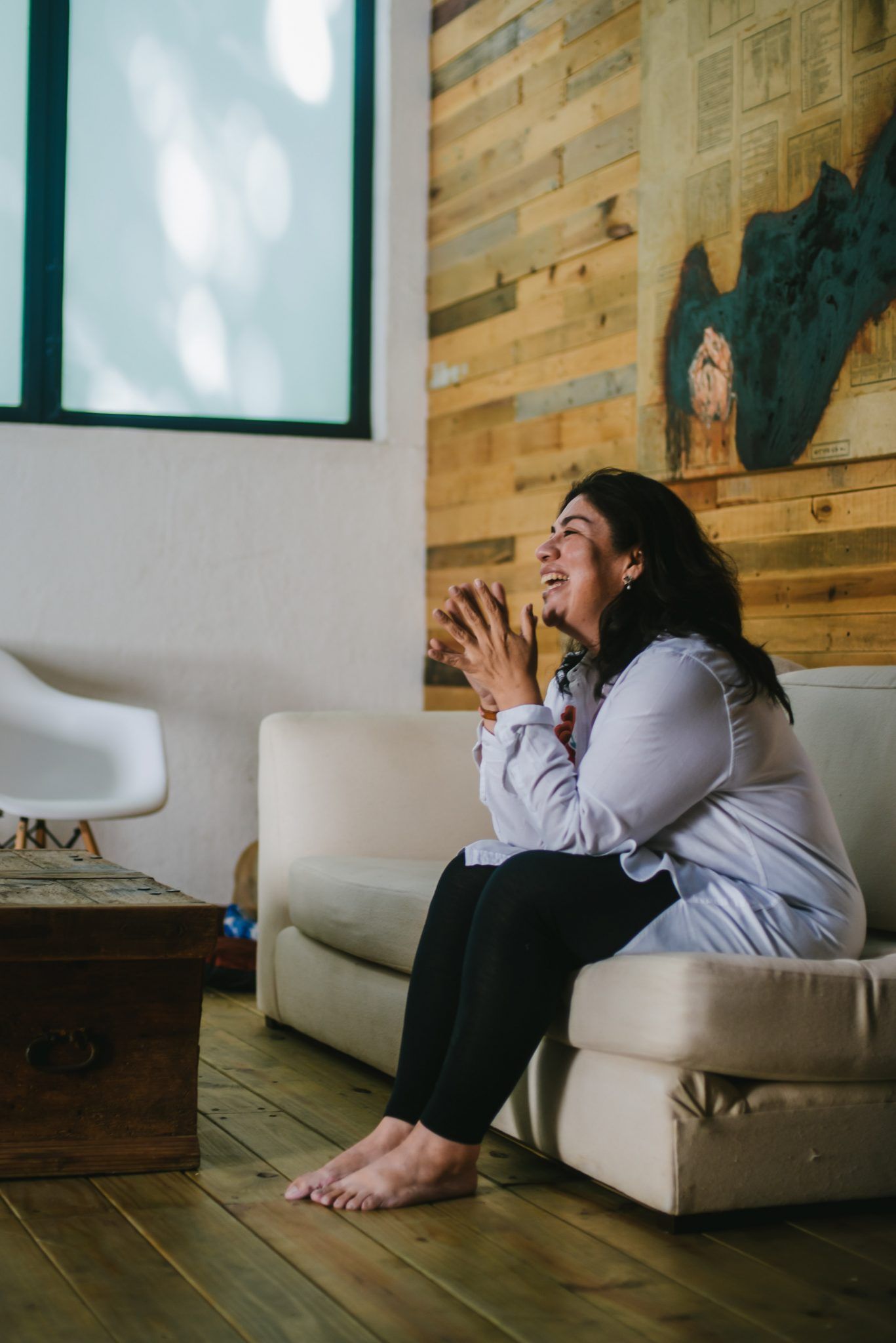 Canva Smiling Woman on Couch