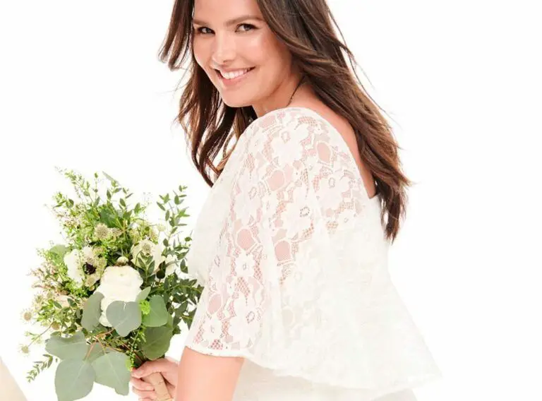 Torrid Wedding Shop Candace Holding Grooms Hand