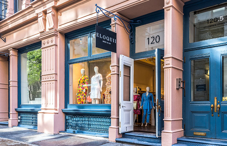 A picture of the Eloquii Soho Storefront location with mannequin in front