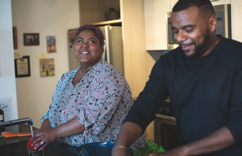 Plus size couple cooking