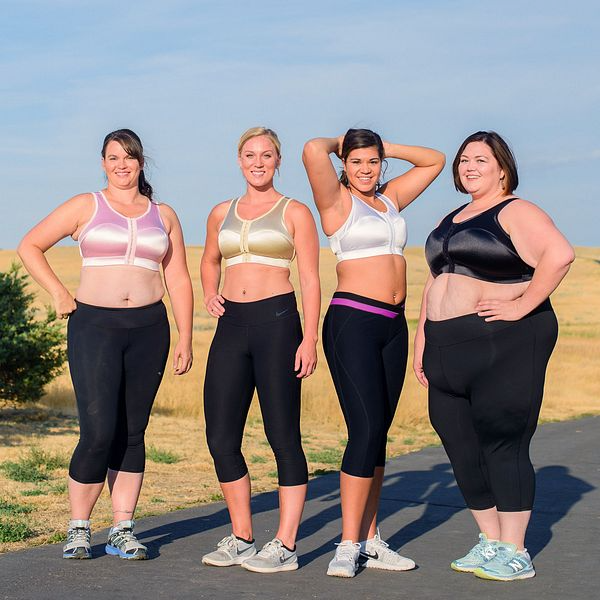 Image of four women wearing the Enell sports bra and black leggings. 