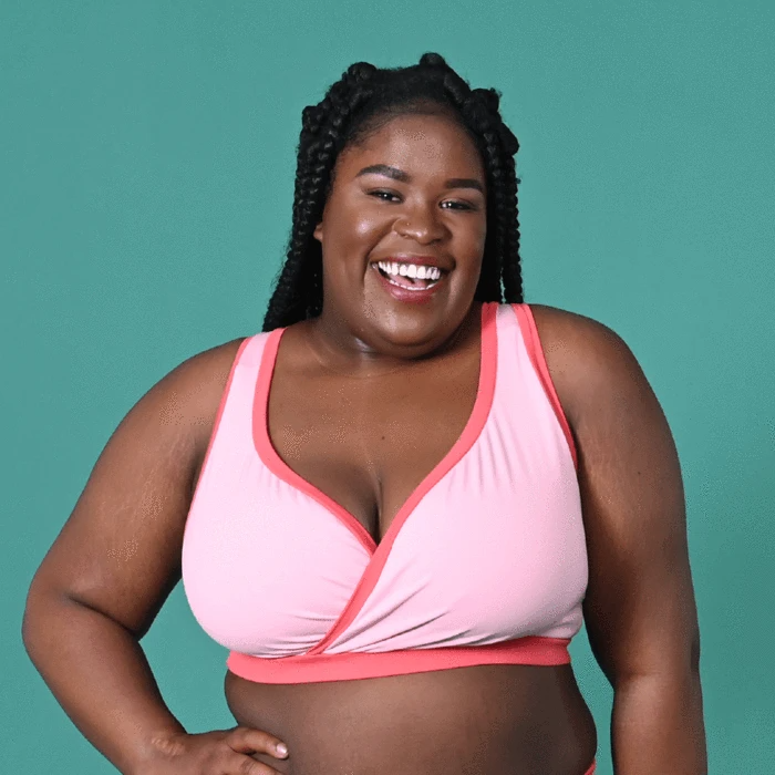 An image of a woman wearing the original Molke bra in a pink color - plus size wireless bra