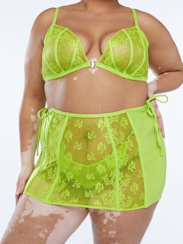 a plus size woman in a lime green lingerie ensemble