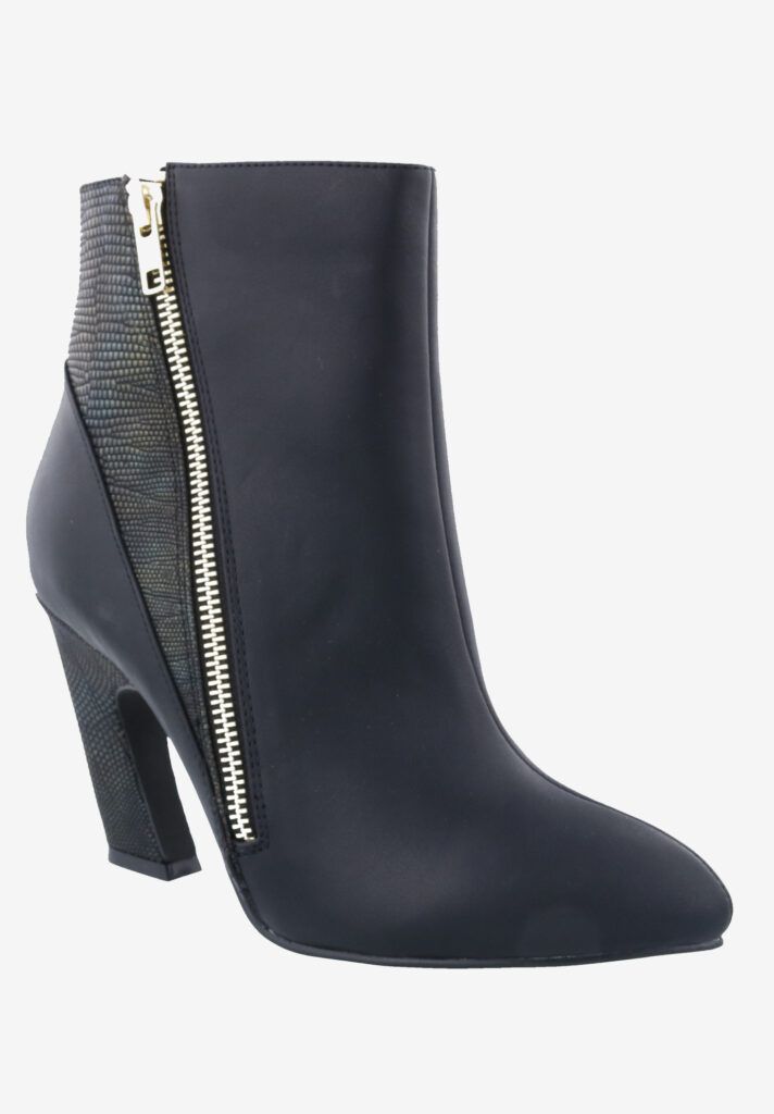 a dark blue boot with zipper 