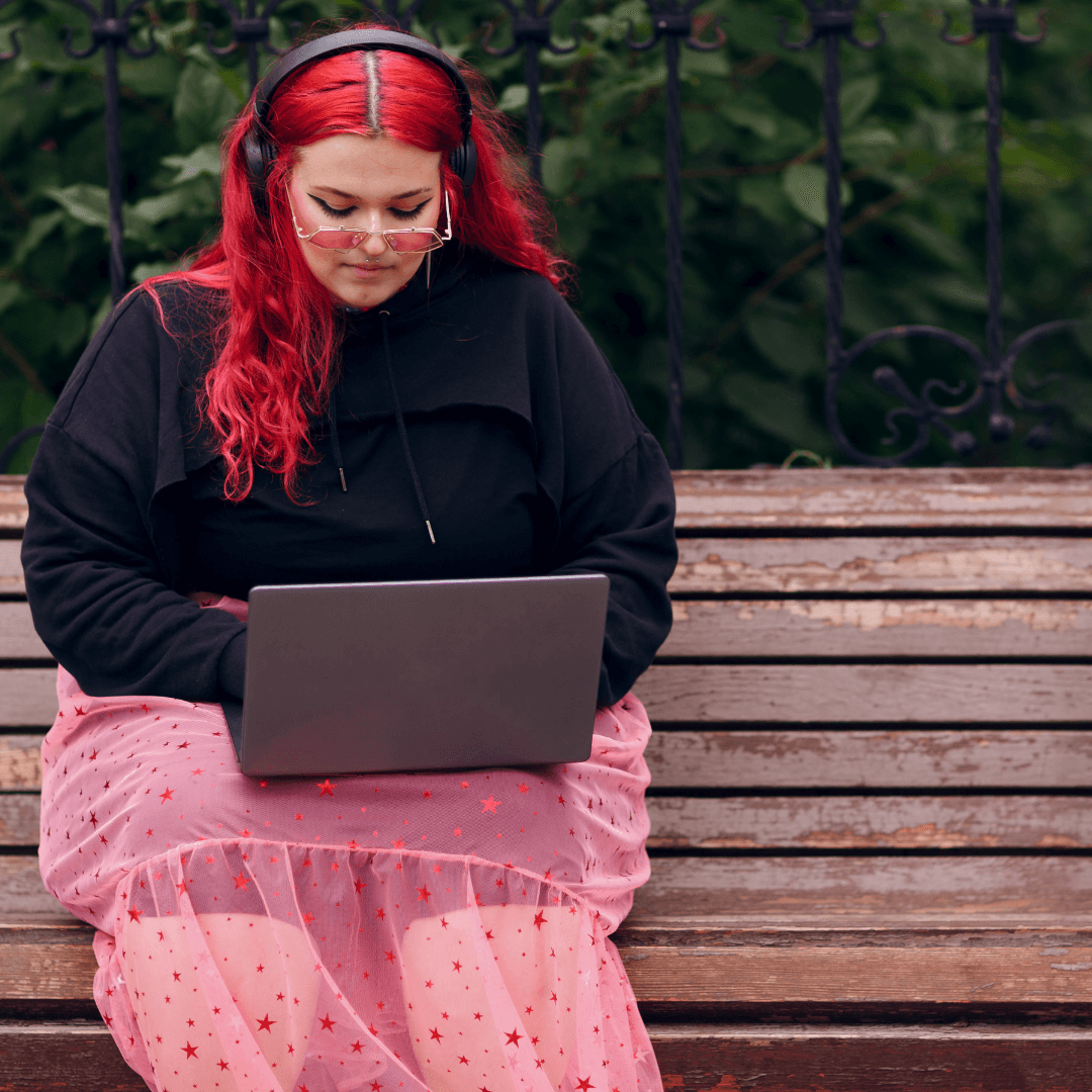 Plus size woman on laptop