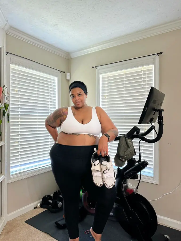 https://thecurvyfashionista.com/wp-content/uploads/2023/10/Plus-Size-Peloton-Spin-Bike-Review-Aaronica-B-Cole-769x1024.jpg