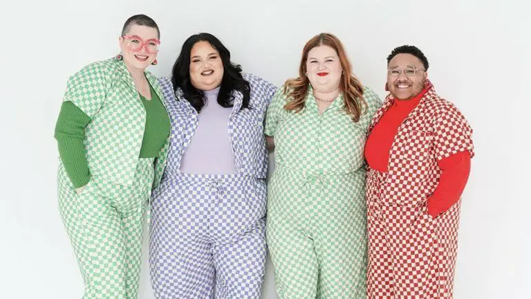 Showcases the 4 co-owners wearing coordinating outfits