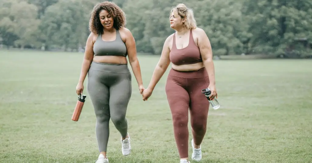Two plus size women go for a walk