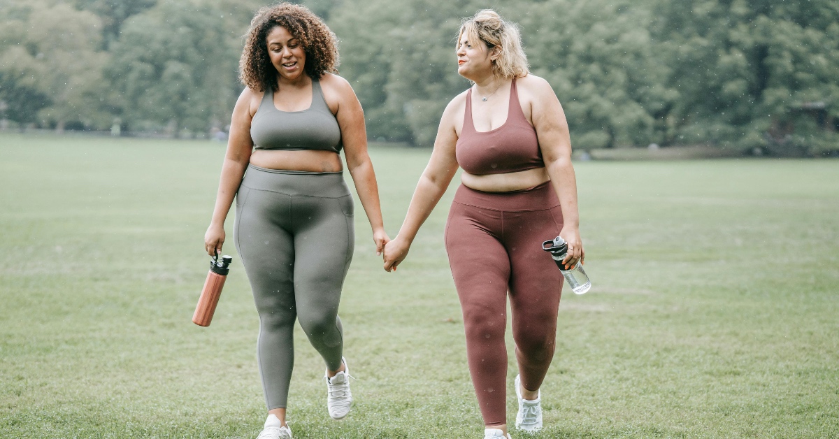 Two plus size women go for a walk
