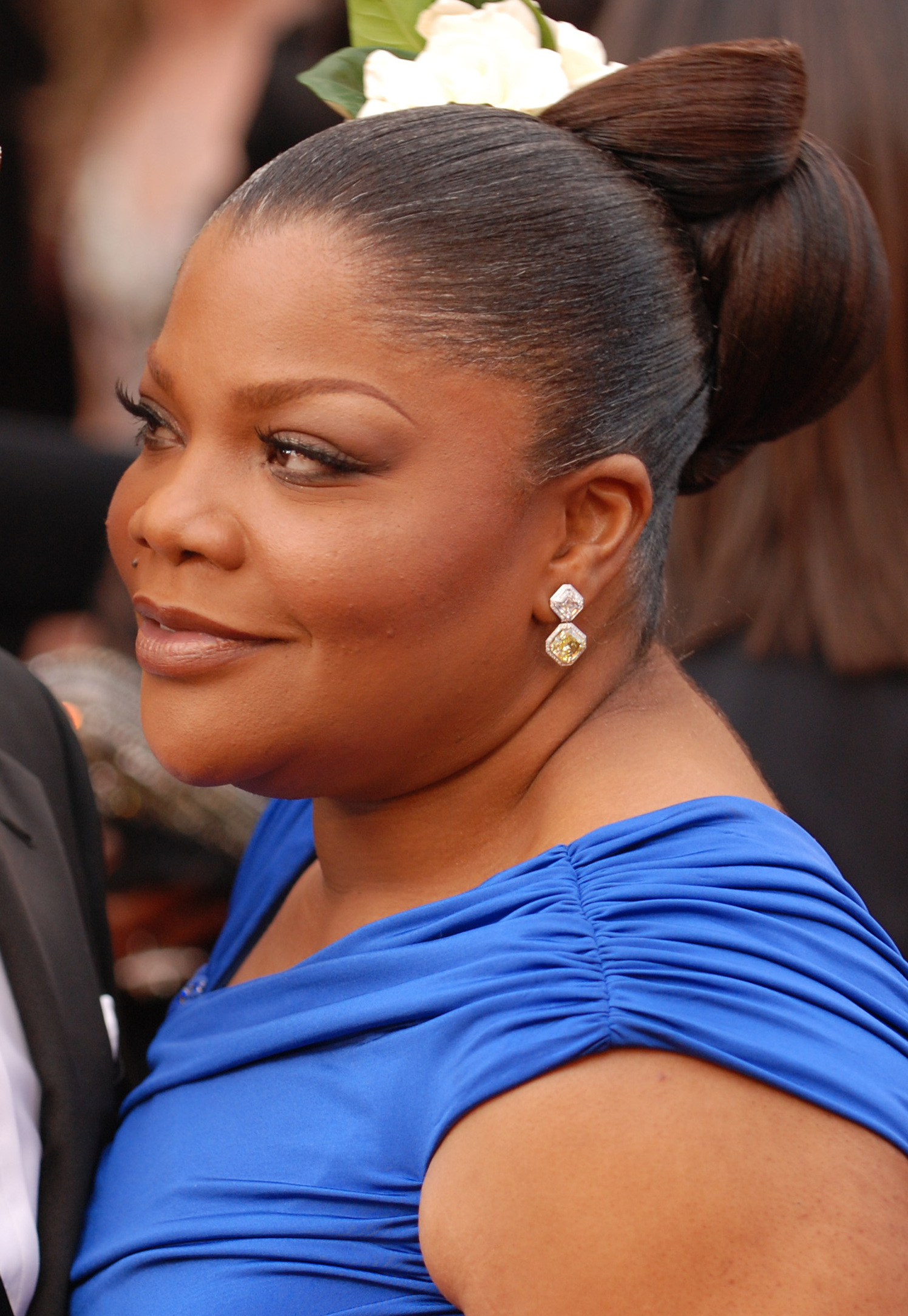 Mo'Nique (image credits: By 82nd_Academy_Awards,_Monique_and_Sidney_Hicks_-_army_mil-66452-2010-03-09-180351.jpg: Sgt. Michael Connors - 302nd Mobile Public Affairs Detachment
derivative work: César (talk), Public domain, https://commons.wikimedia.org/w/index.php?curid=10395205)