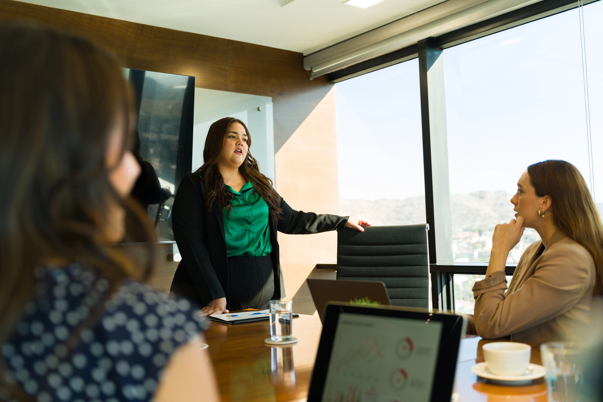 plus size leadership plus size woman at work celebrating