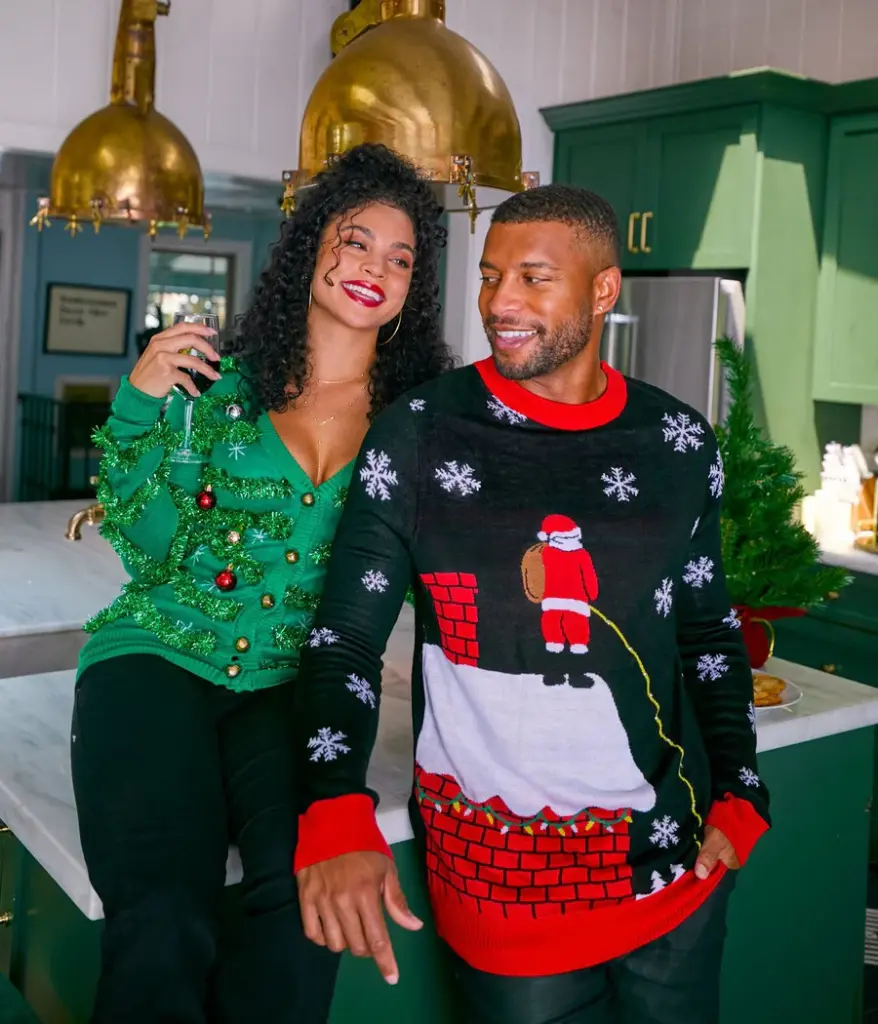 Couple in Ugly Christmas Sweaters