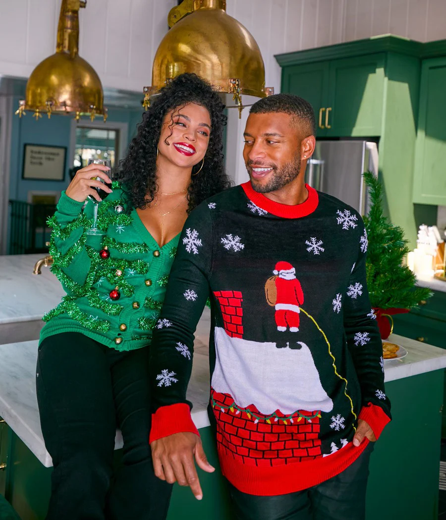 Couple in Ugly Christmas Sweaters