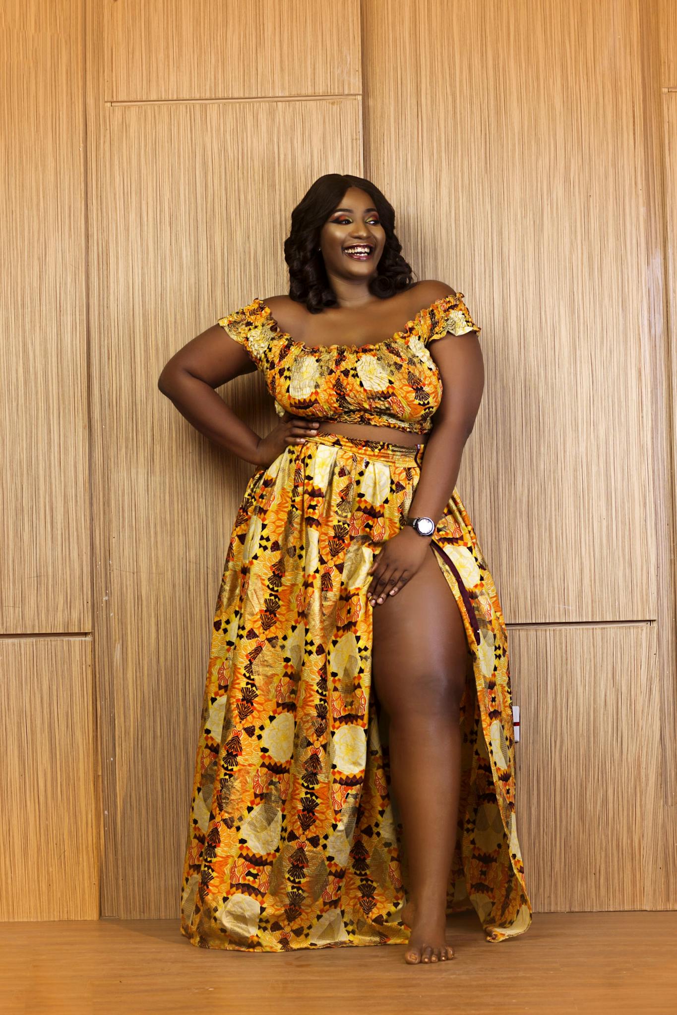 Confident African woman posing elegantly in a vibrant yellow dress, embodying style and grace.
posture tips for plus size women