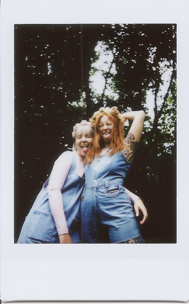 Two women having fun in denim jumpers, exuding a playful vibe.

compliments plus size women want