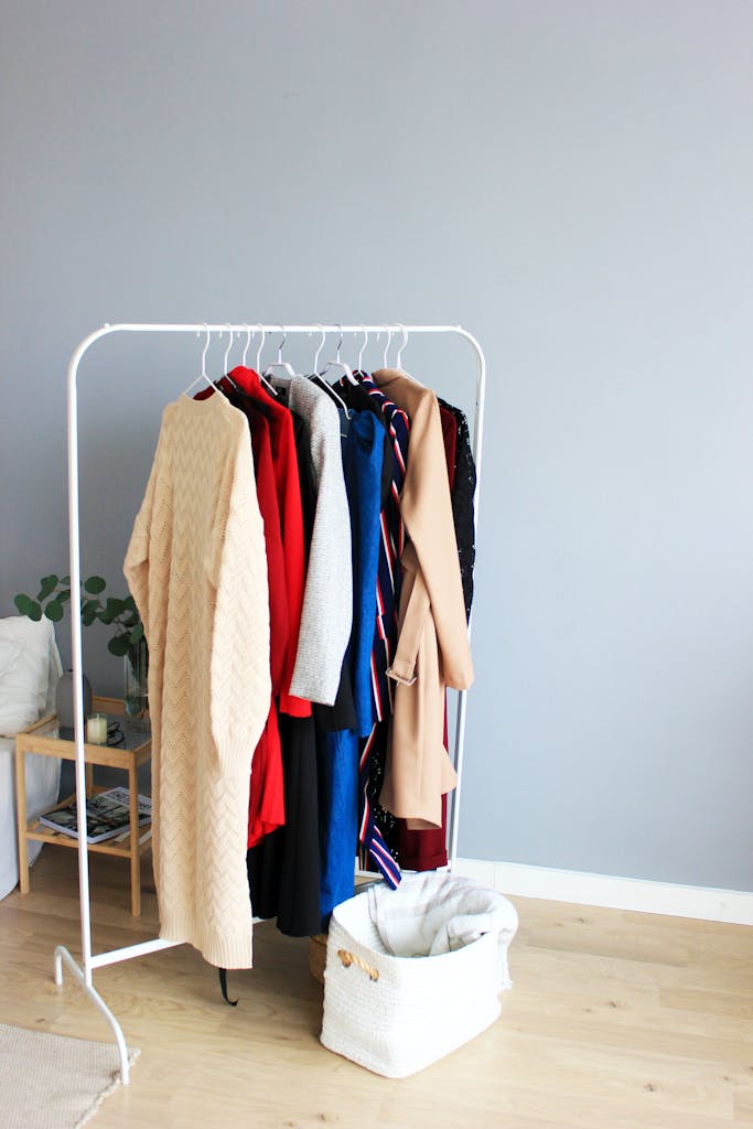 Elegant selection of clothes on a minimalist rack in a modern interior setting showing plus size market growth