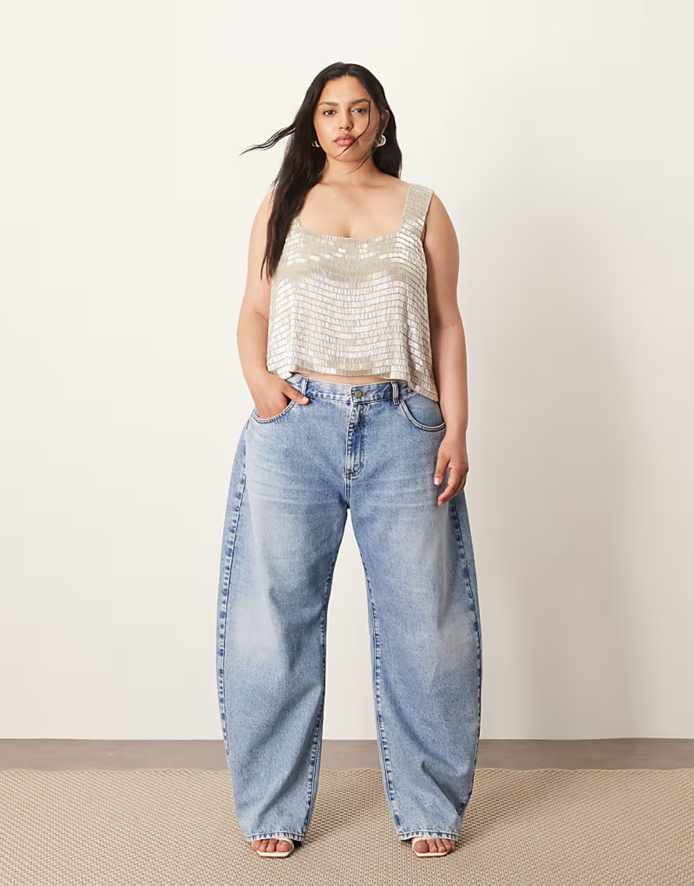 ARRANGE Curve Tova tapered curved leg jeans with cuffed hem in light wash
plus size shopping tips