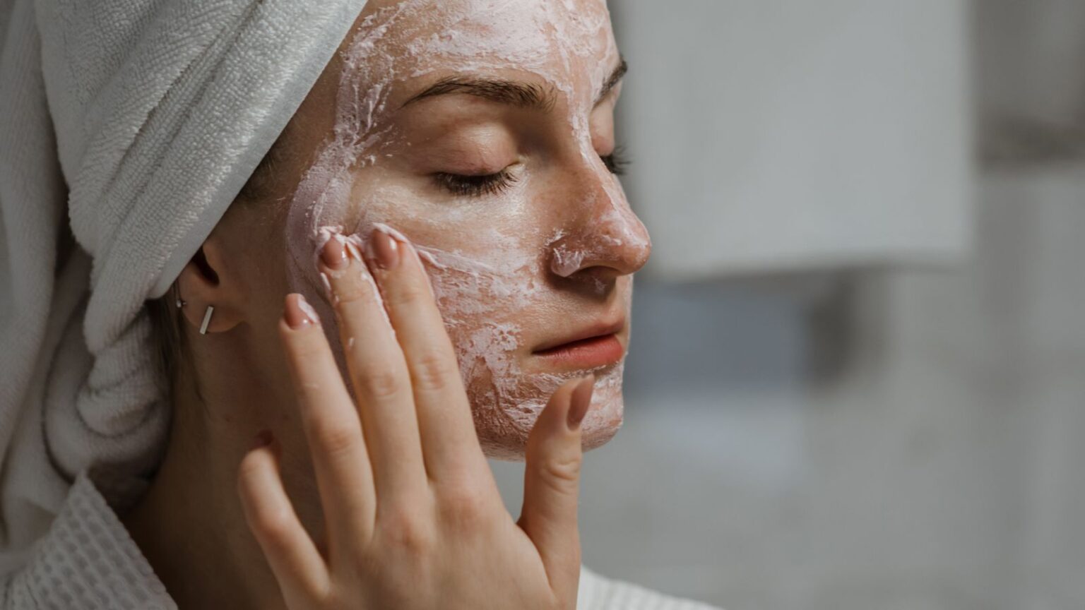 Lady cleansing skin
