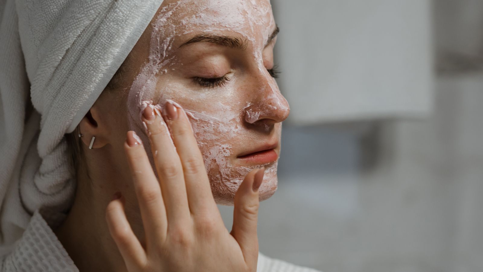 Lady cleansing skin