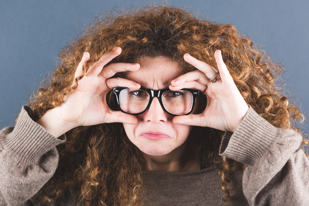 Nerd Woman on Gray Background