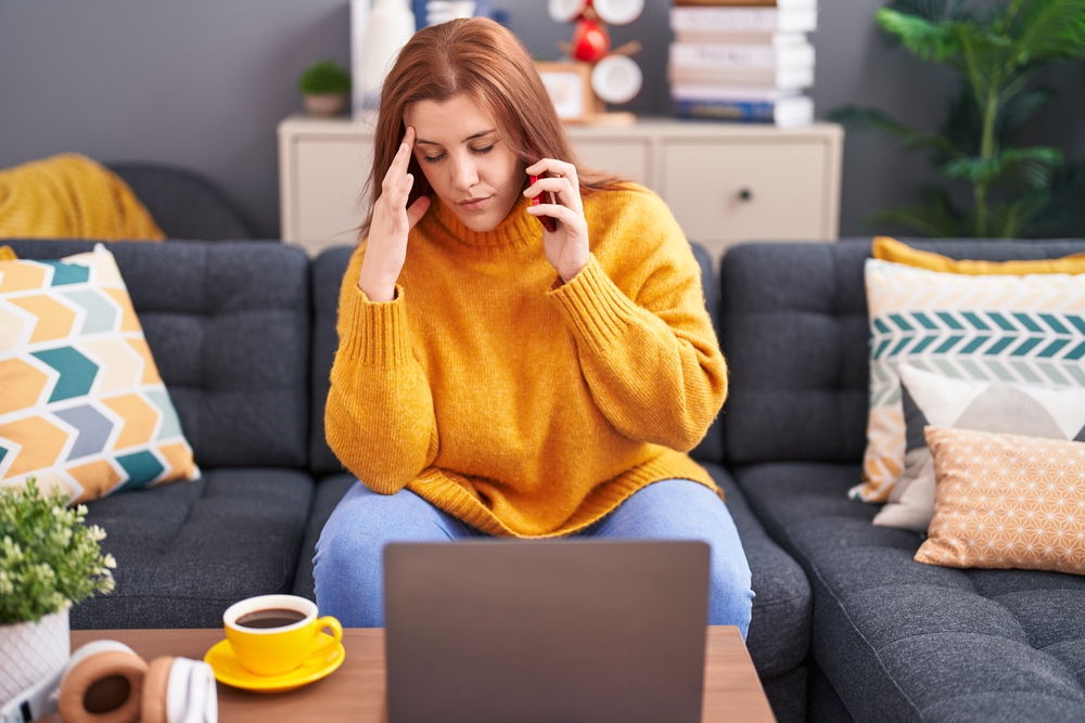Sad plus size lady on a phone call