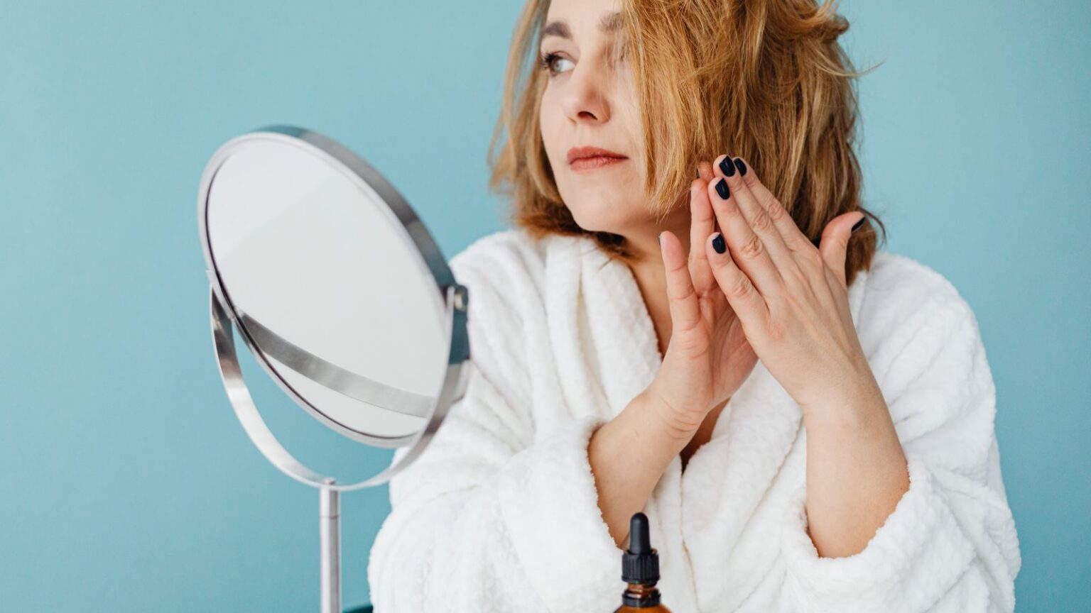 Woman conditioning hair