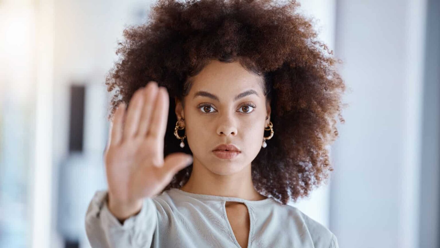 Woman saying no. Image credit PeopleImages.com Yuri A via Shutterstock