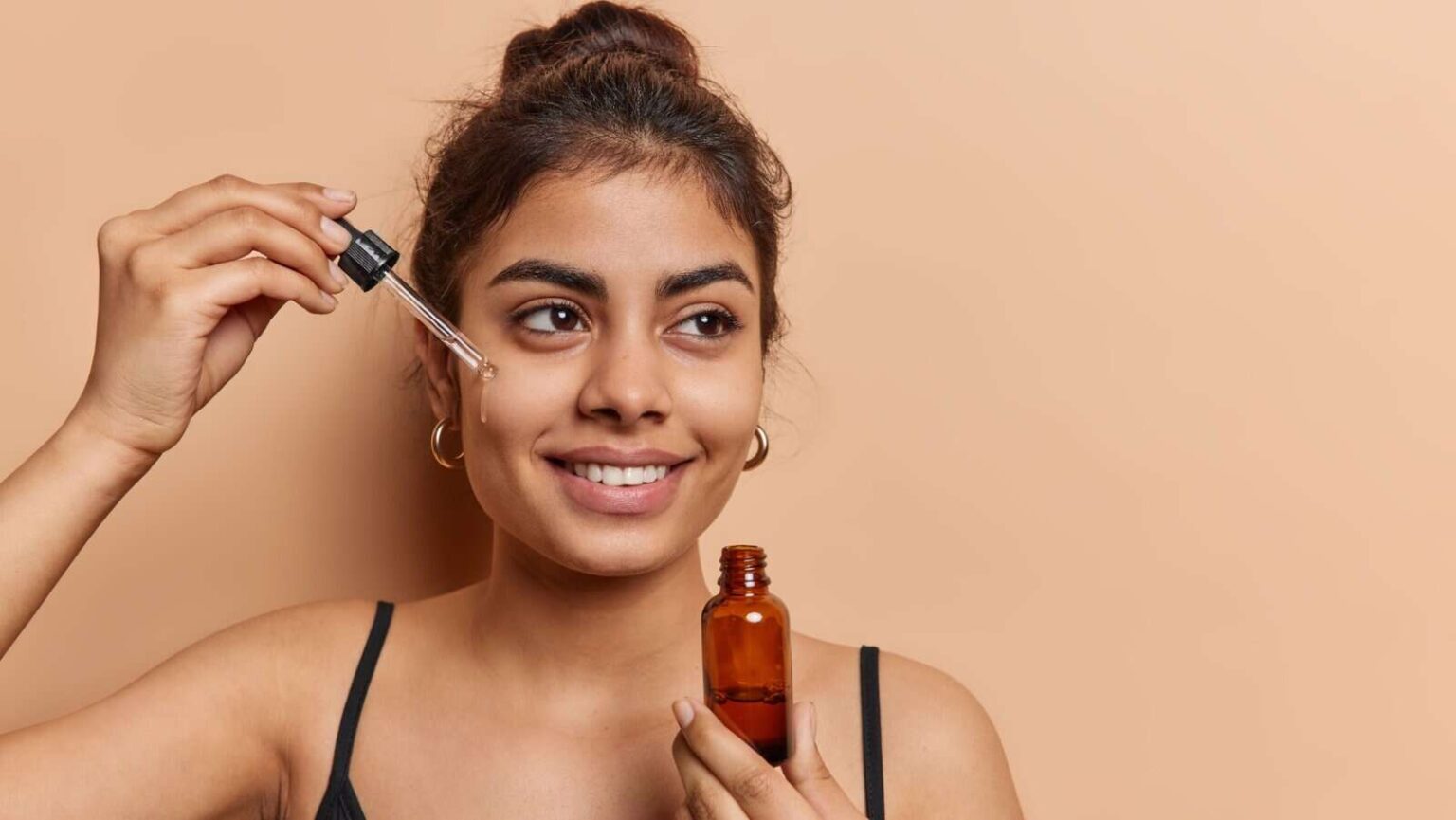 apply serum. Wayhome Studio via Shutterstock