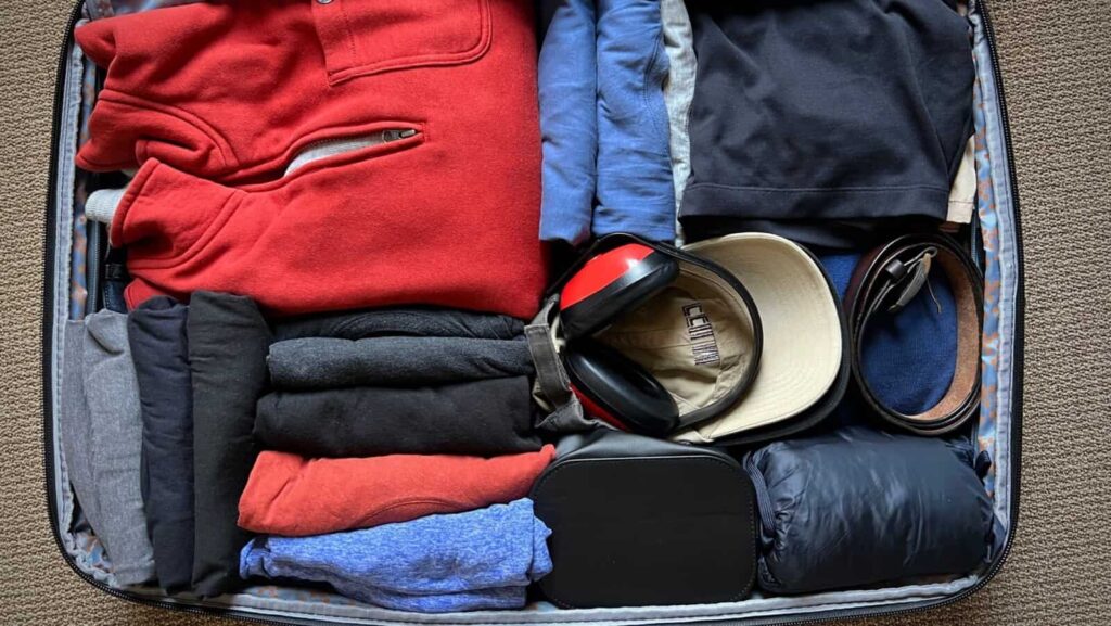 packing layers. suitcase. vesperstock via Shutterstock