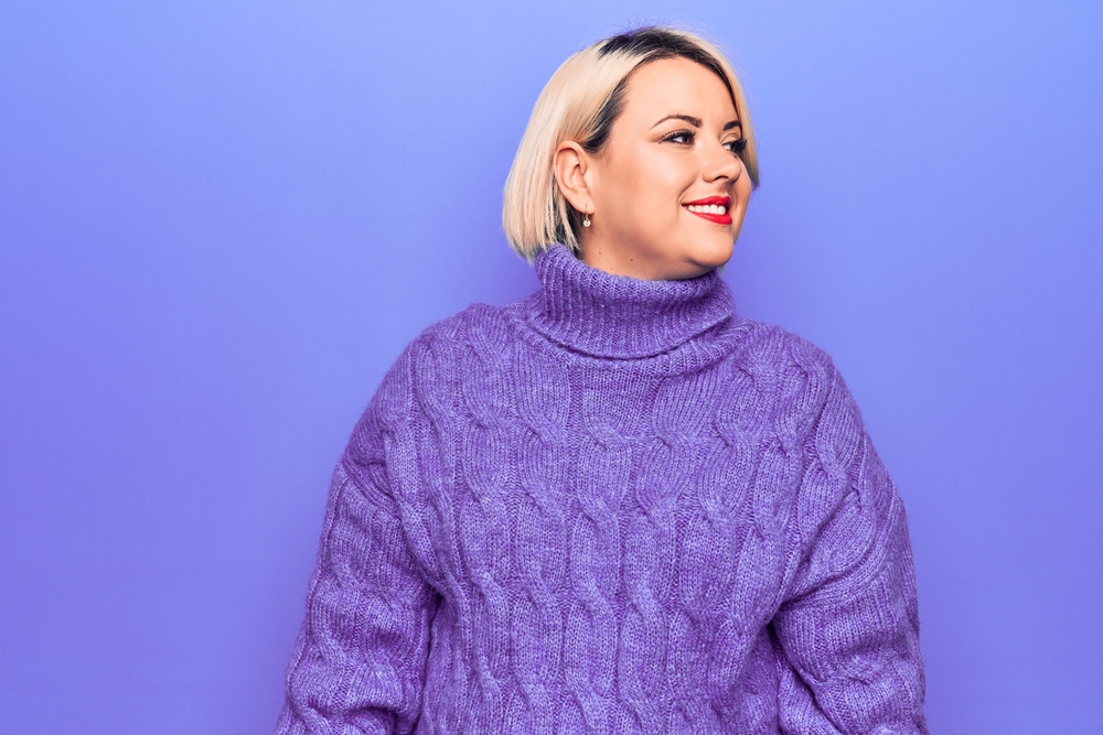 plus size woman wearing turtleneck sweater
