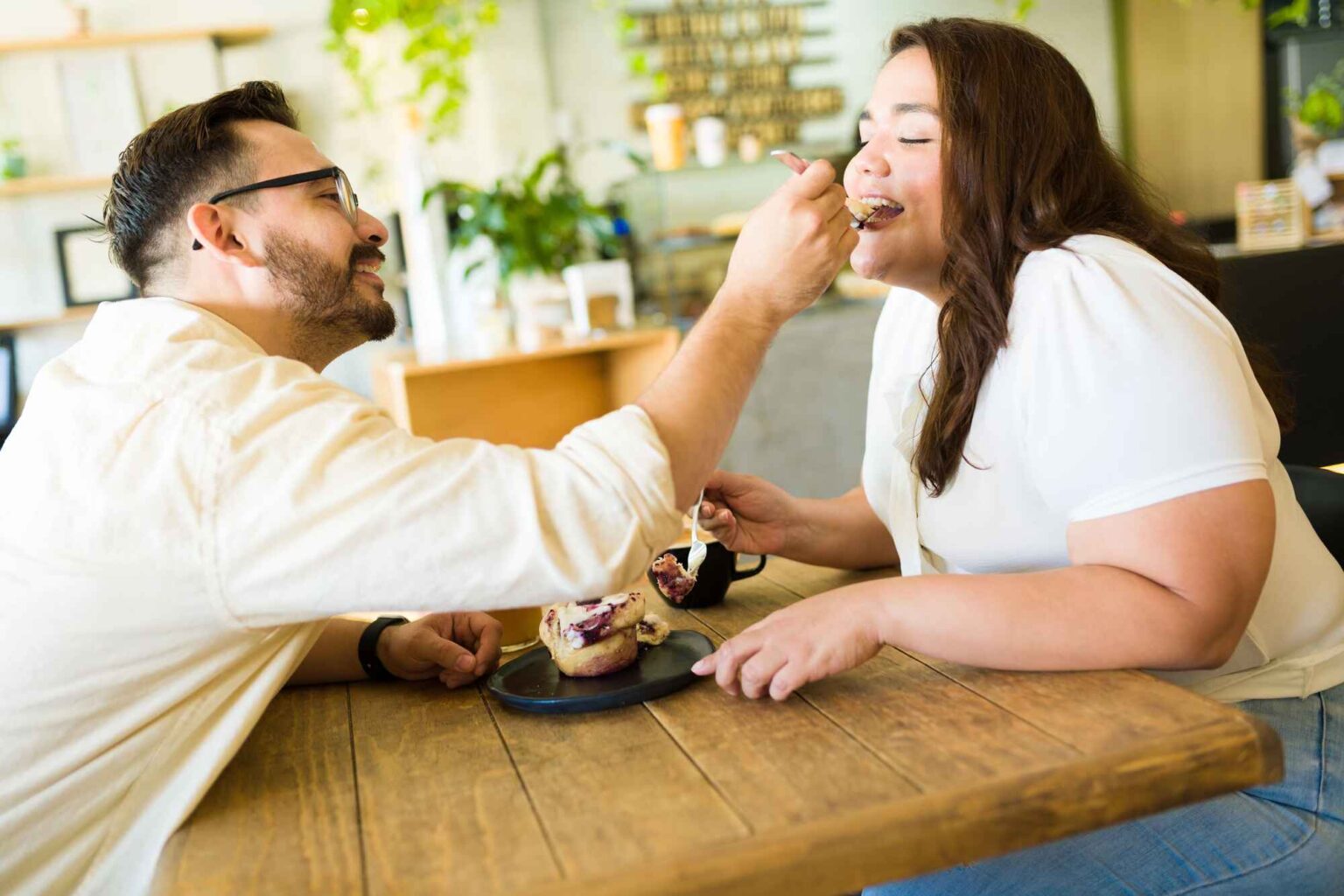 stock photo romantic man feeding dessert his.jpg 1