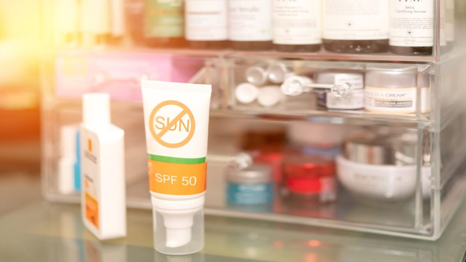 stock photo sunscreen packaging on table with cosmetics 2110105007.jpg