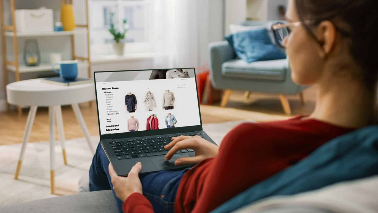woman clothes shopping online. Image credit Gorodenkoff via Shutterstock
